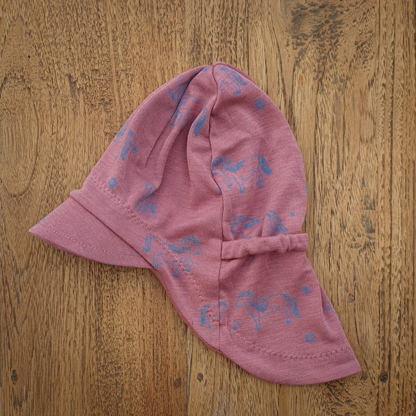 Sonnenhut Muster auf rosa, lila, pink