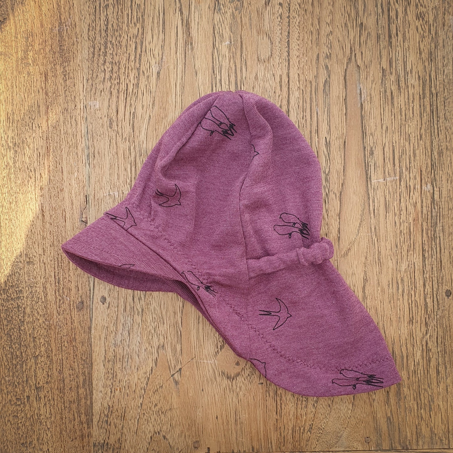 Sonnenhut Muster auf rosa, lila, pink
